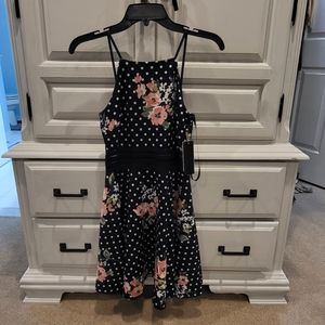 Brand new with tags Macy's dress perfect for teens or tweens.